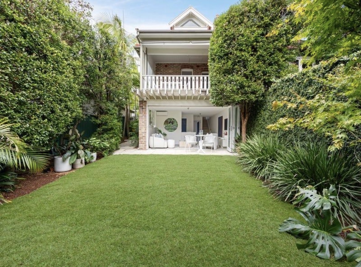 Freshly mowed backyard lawn behind a Sydney Eastern Suburbs home